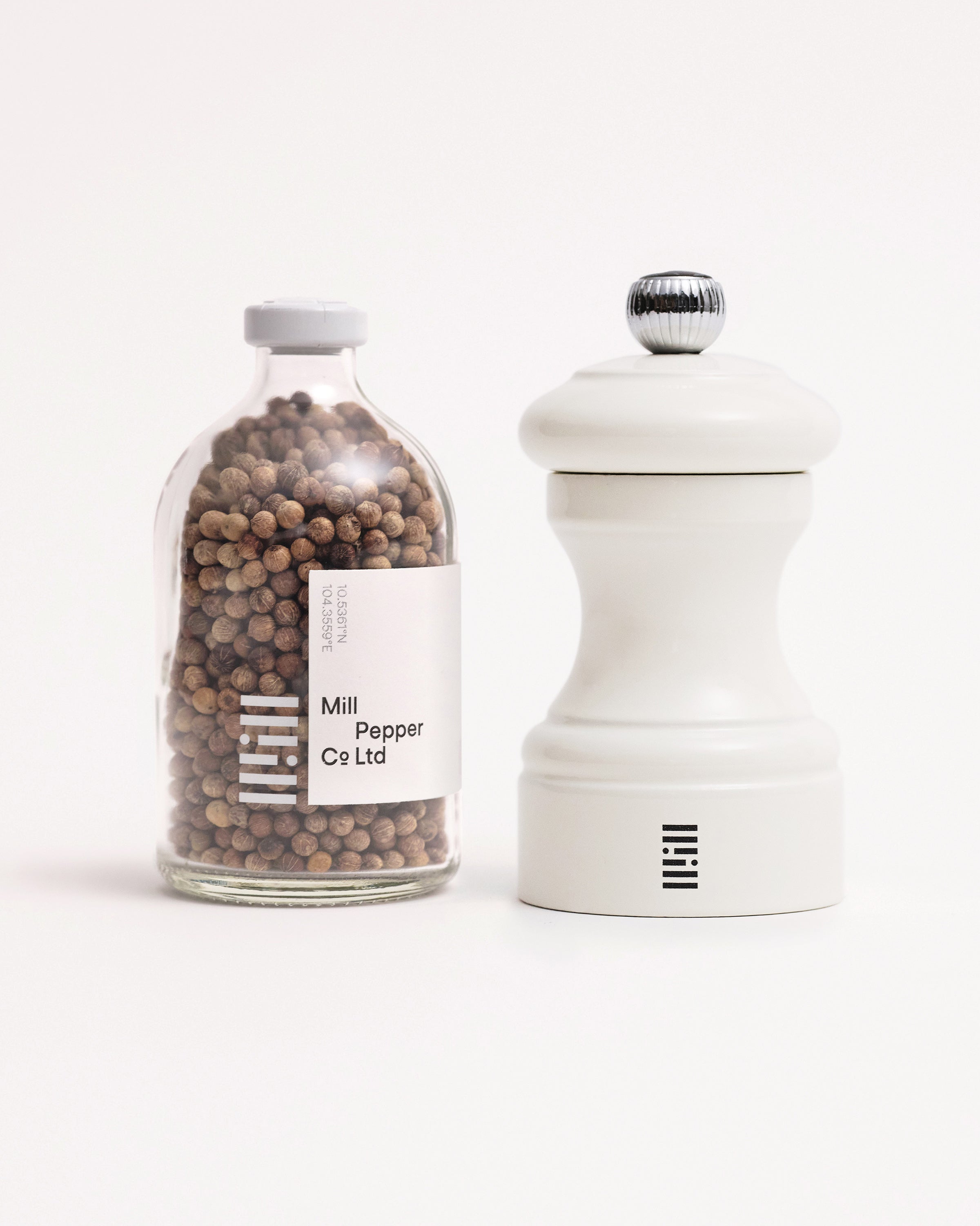 While peugeot mill and white kampot whole peppercorn set.