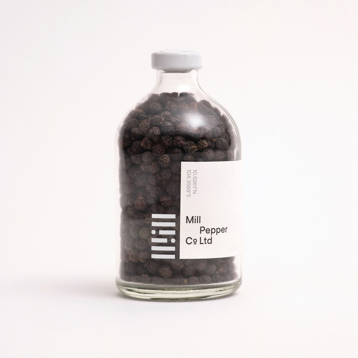 Mill Pepper Co. Black Pepper bottle shot on white. 