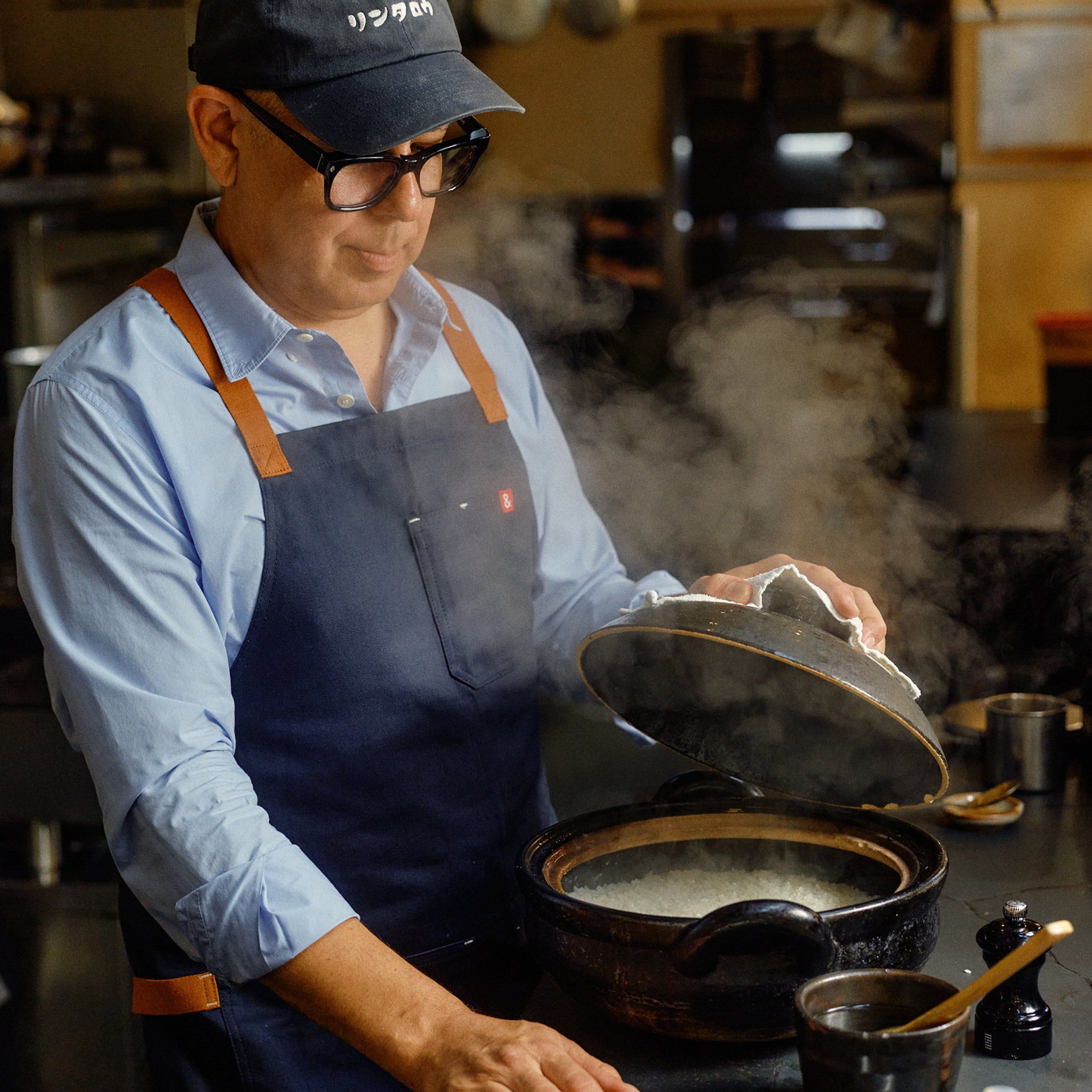Chef steaming pot