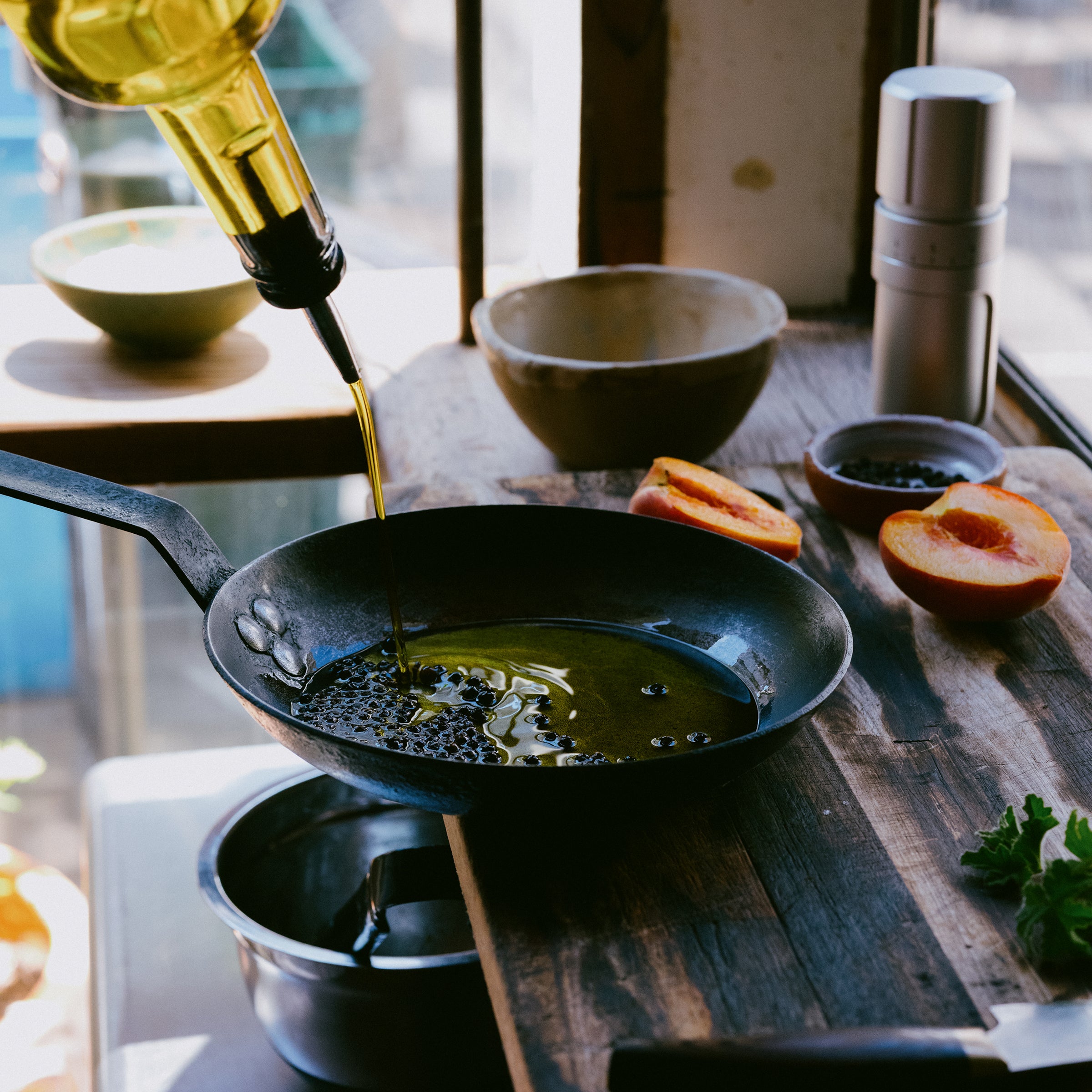Peppercorn toasted in a cast-iron skillet.