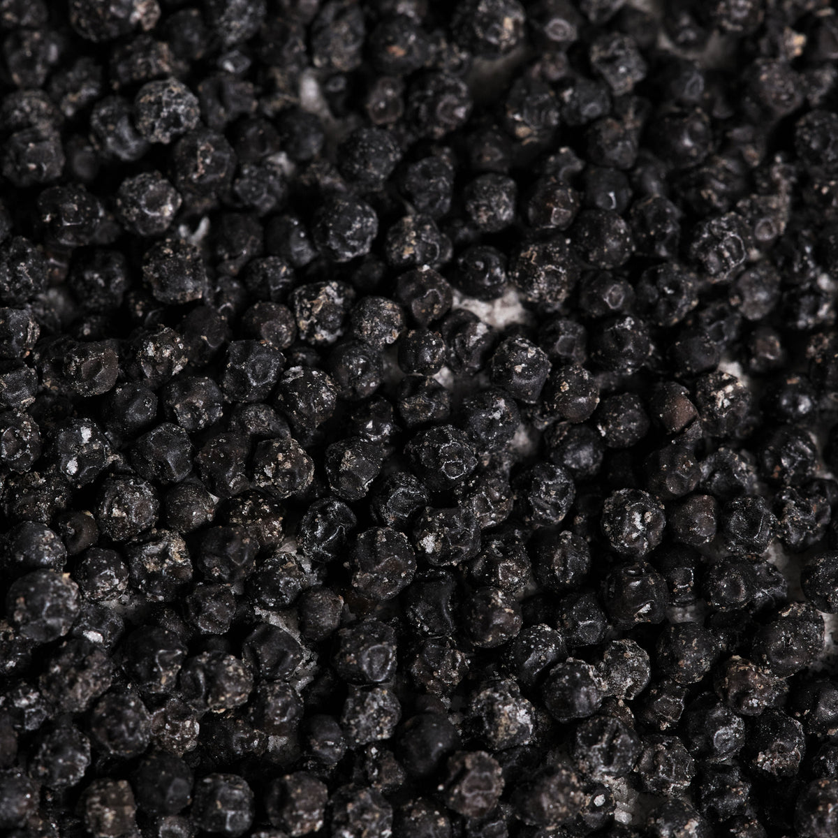 Macro shot of green peppercorns