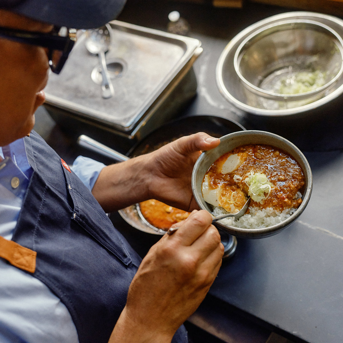 Chef preparing rice bowl